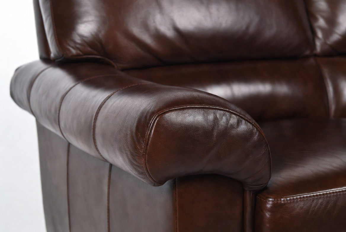 Restored leather sofa arm detail